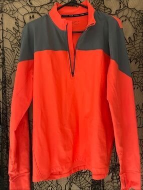 Under Armor Men’s Half-Zip Pullover in Bright Coral and Charcoal